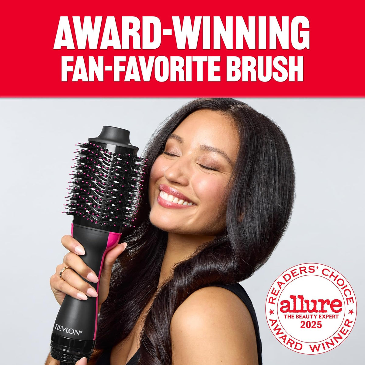 Revlon One-Step Volumizer Hair Dryer & Hot Air Brush – model holding the brush with Allure Readers' Choice 2025 badge – photo 4 of 8